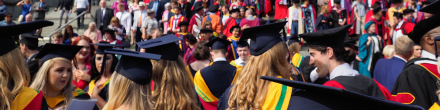 graduates socialising outside of cathedral